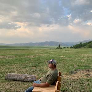 My husband enjoying the view after setting up the tent! 😉❤️