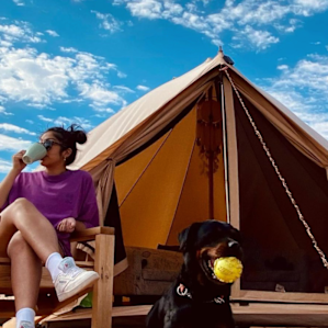 Enjoying the morning's complimentary coffee as Ruby enjoys her morning ball play.