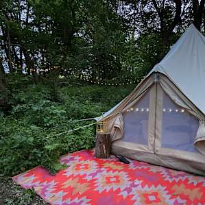 The site is large & we loved how the eating area & fire ring were set back from the tent.