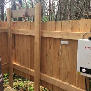 Outdoor shower with heating unit for water. Shampoo/ body wash provided!