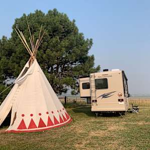 Tipi near a Trout Pond