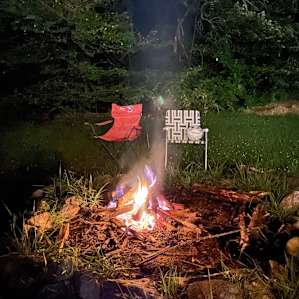 Campfire set up….and Wilson (who was already there) made an appearance (see white chair)! Lol