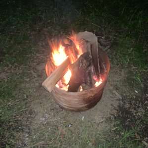 Fire pit with supplied barrel