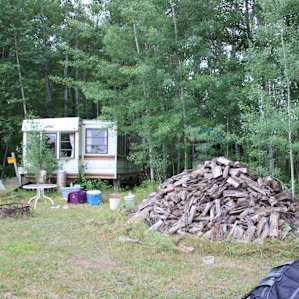 Camper and available firewood.