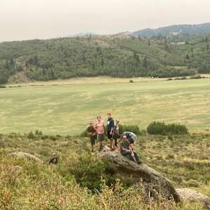 View from rock with hole across the valley from camp. Camp in background