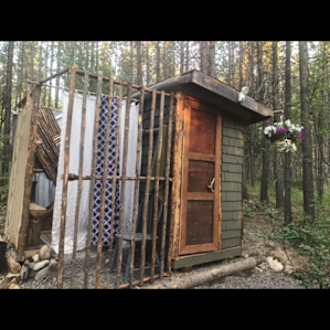 Shower/bathroom building. Private, locking bathroom door and a shower you won’t want to get out of
