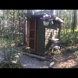 Adorable vanity beside bathroom/shower building