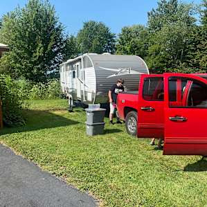 This was where we were able to park our camper. It is beside the garage and was wet quite there