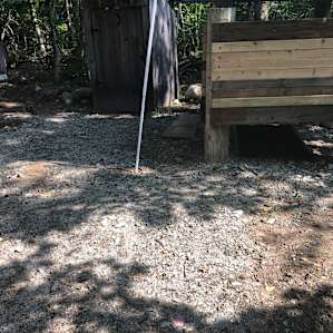 Outhouse with composting toilet, outdoor shower