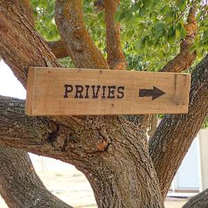Ha ha, not really a “privy”, actually flush toilets and showers worthy of a nice hotel.