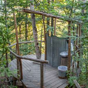 Moon House is one of the most unique outhouses we've ever seen! It's an open air toilet with beautiful views of the trees.