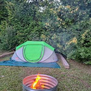 Creek side cabins and tent camping