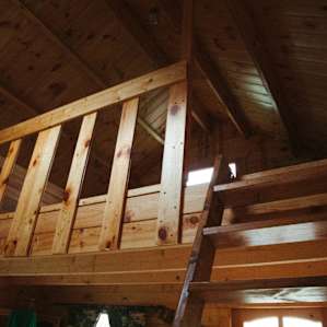 The loft level has another bed set-up for additional guests. It's also tall enough to comfortably stand up on either floor.