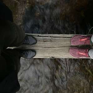 An evening stroll and a stop on a foot bridge crossing the little creek that strolls around and through Bliss Camp.