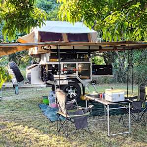 Nestled in to one of two camping spots, tucked away from the main house and looking out to the river.