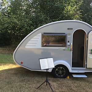 Private setting under tall trees