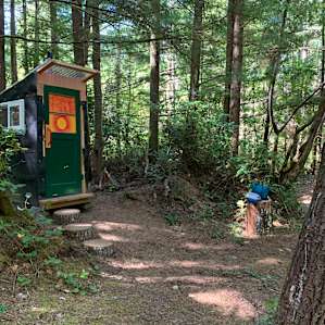 I was glad for a place to set my stuff when I needed to use the outhouse.