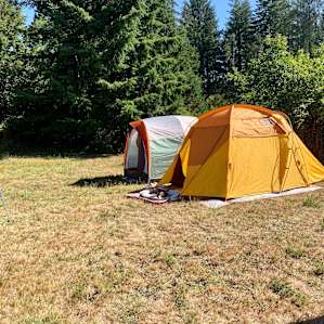 The field area we made our camp in was surrounded by trees on 3 sides, then our cars and the garden on the other.