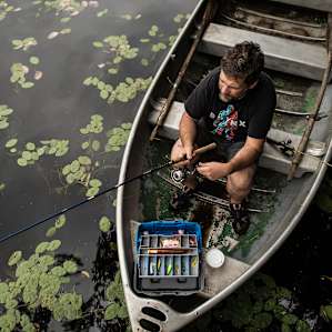 Fishing from the rowboat.