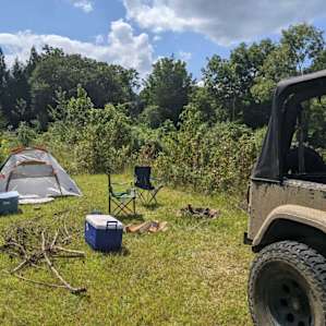 15 acres with a pond and a creek