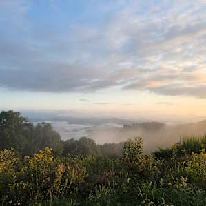 More mist in the valley shortly after sunrise. The mist eventually made its way up to the site and washed over us.