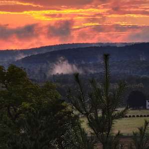 Tent camping with a hilltop view