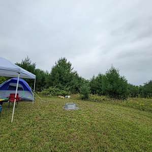 Tent camping with a hilltop view