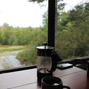 Coffee on the porch--cabin comes stocked with a mini french press.
