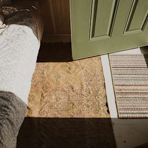 From the door the bed, a spacial observation.