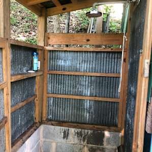 Shower connected to rain barrel reservoir