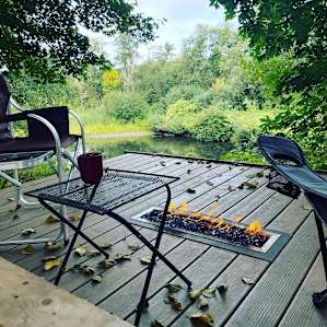 Brilliant little deck with live gas fire box. Wonderful spot to enjoy a morning cup of coffee!!