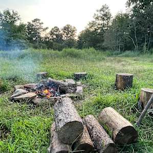 Grass knee high and logs too large for a good fire