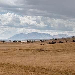 The scenery is breathtaking. You can see the road in the foreground.