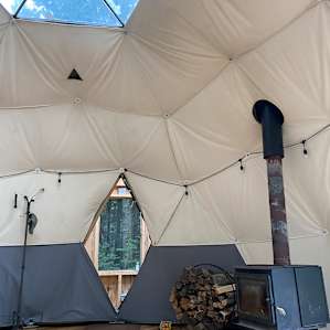 Interior view of the dome. Cozy fireplace keeps the room very warm