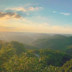 This is one of 4 look outs on your way up the mountain. Just a five minute drive from camp. Sun setting