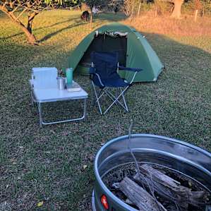 Campsite close to house and barn.