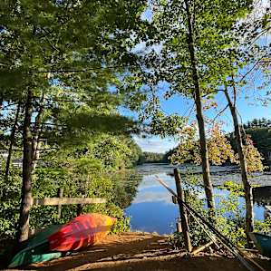 View from cabin 2. Kayaks ready to launch into the pond