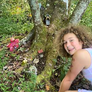 There are interesting camp sites on the property with places to explore. We found this fairy and rearranged her little home.