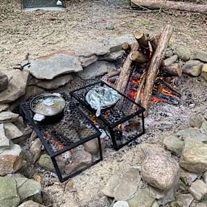 Lunch and dinner going while keeping warm by fire
