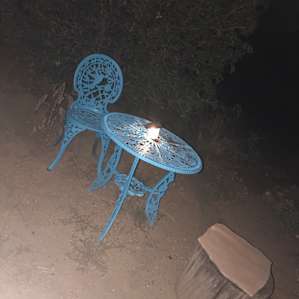 The cute table out front, where Lori placed a light for nighttime enjoyment.