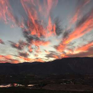 Smokey skies help color the sunset