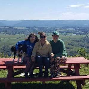 Daisy dog, my youngest daughter, myself, my oldest daughter.