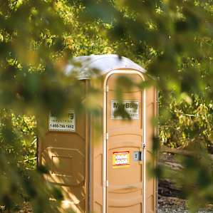 There is a very clean portable bathroom for the campsites to use!