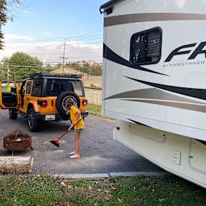 Grassy RV camping with trees