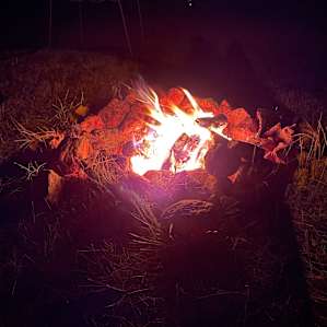 Supplies a spot for a fire.