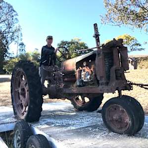 Bill riding the tractor