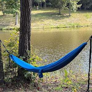 Tent camping by seven acre pond