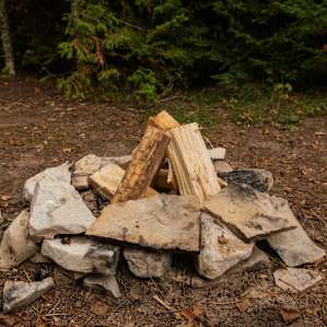 The firepit is made from stones. We brought our own firewood (sold at most gas stations in the area)