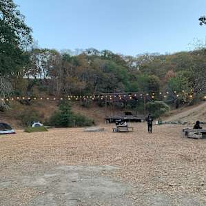 Picnic table (center) and sink area (right)