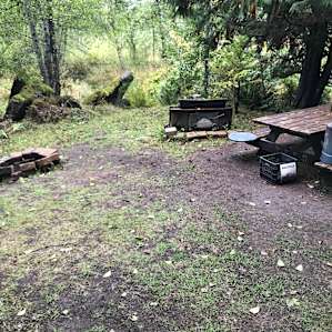 view of the picnic table and firepit